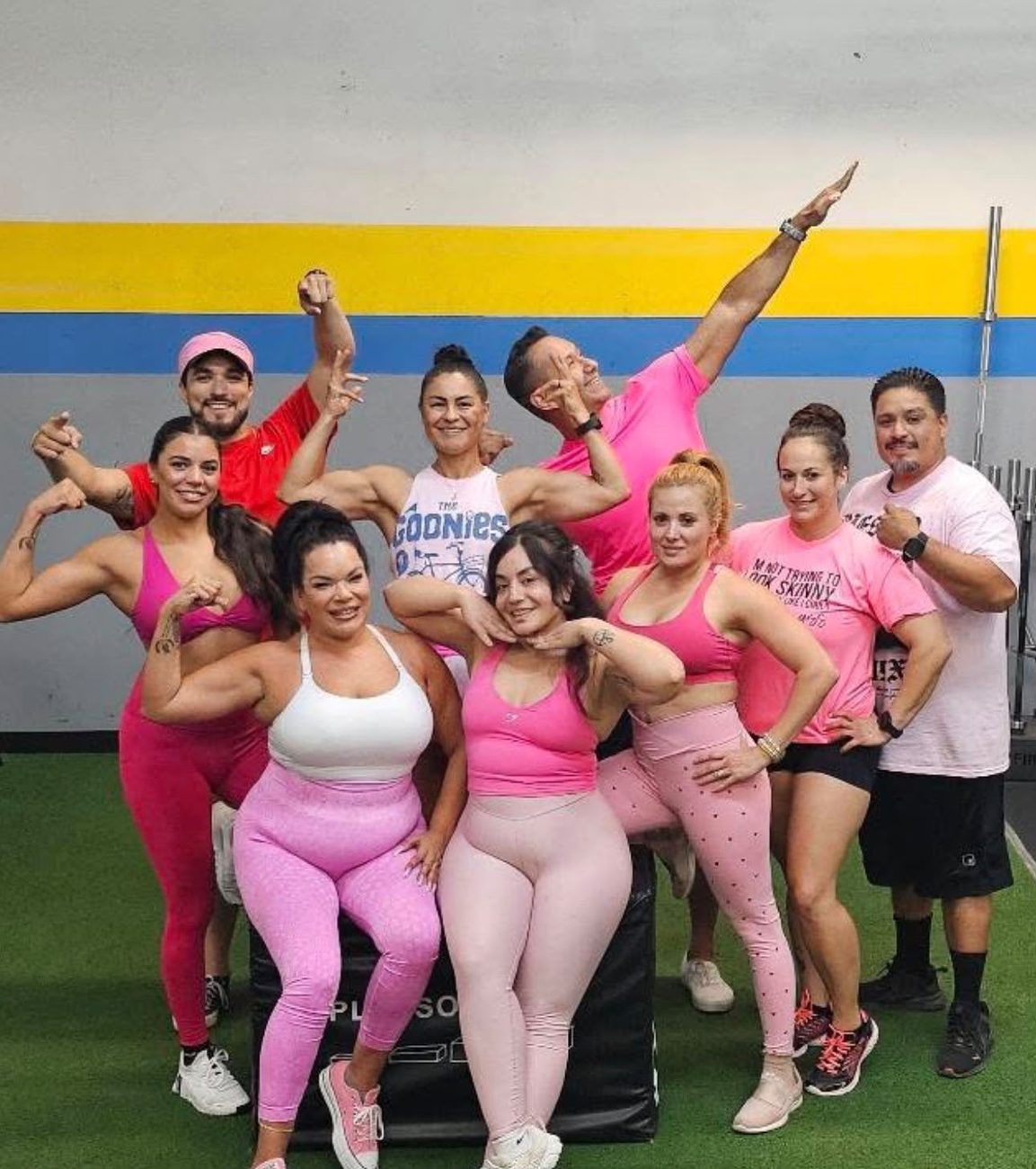 Evolve by L1G members celebrating after training